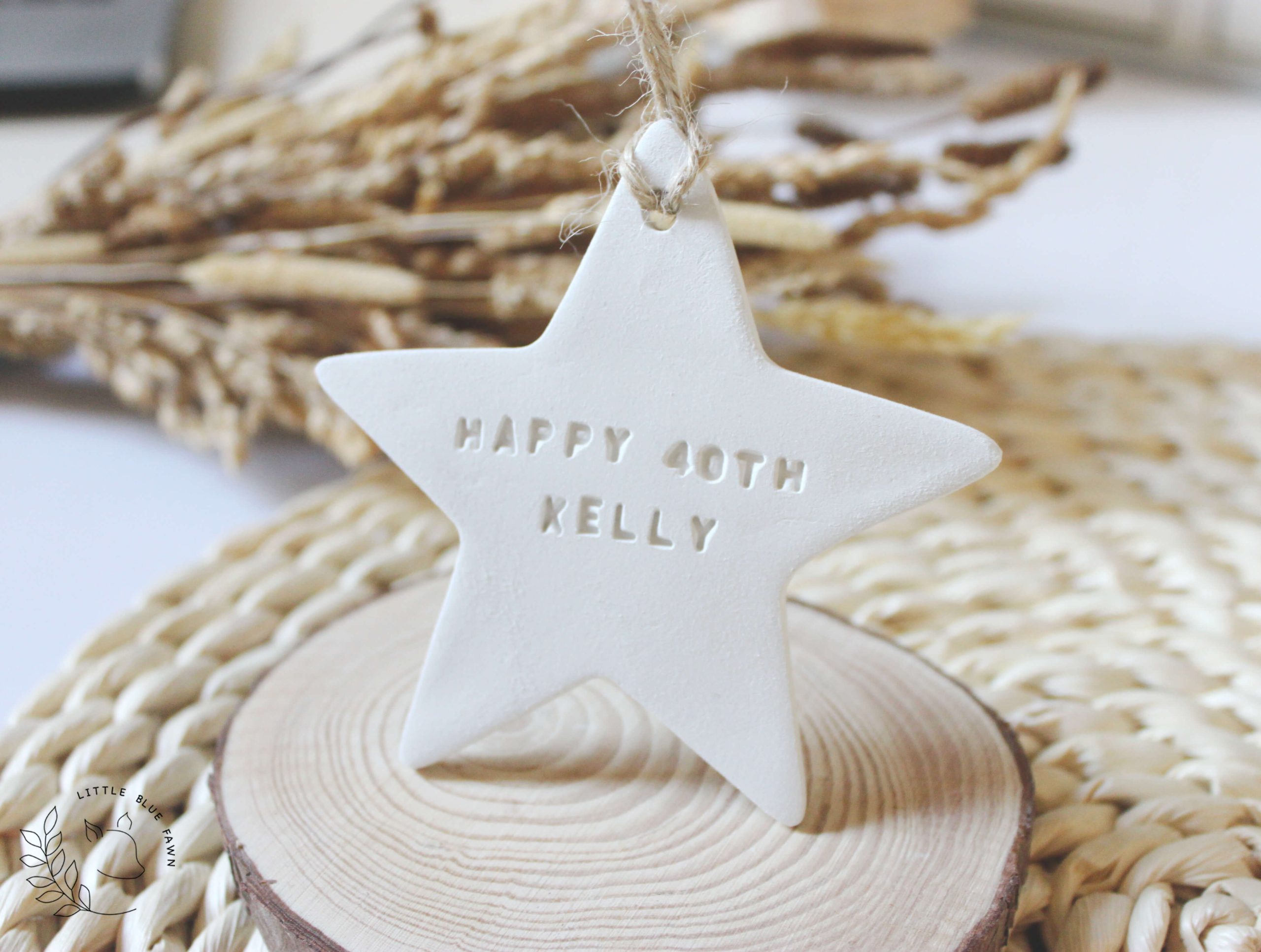 Personalised 40th Happy Birthday star keepsake handmade from clay and customised with a name and age. A thoughtful birthday gift and lasting memory.